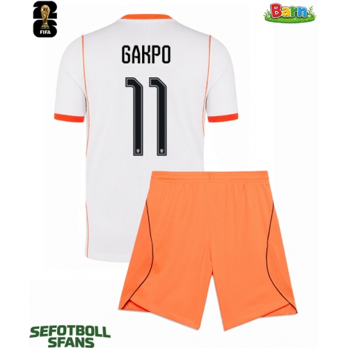 Nederländerna Cody Gakpo #11 Bortaställ Barn VM 2026 Kortärmad (+ Korta byxor)